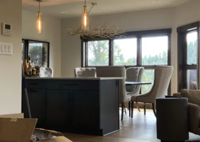 A living room with furniture and boxes on the floor.